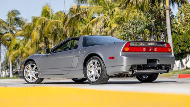 Silver NA2 Acura NSX rear three-quarter view.